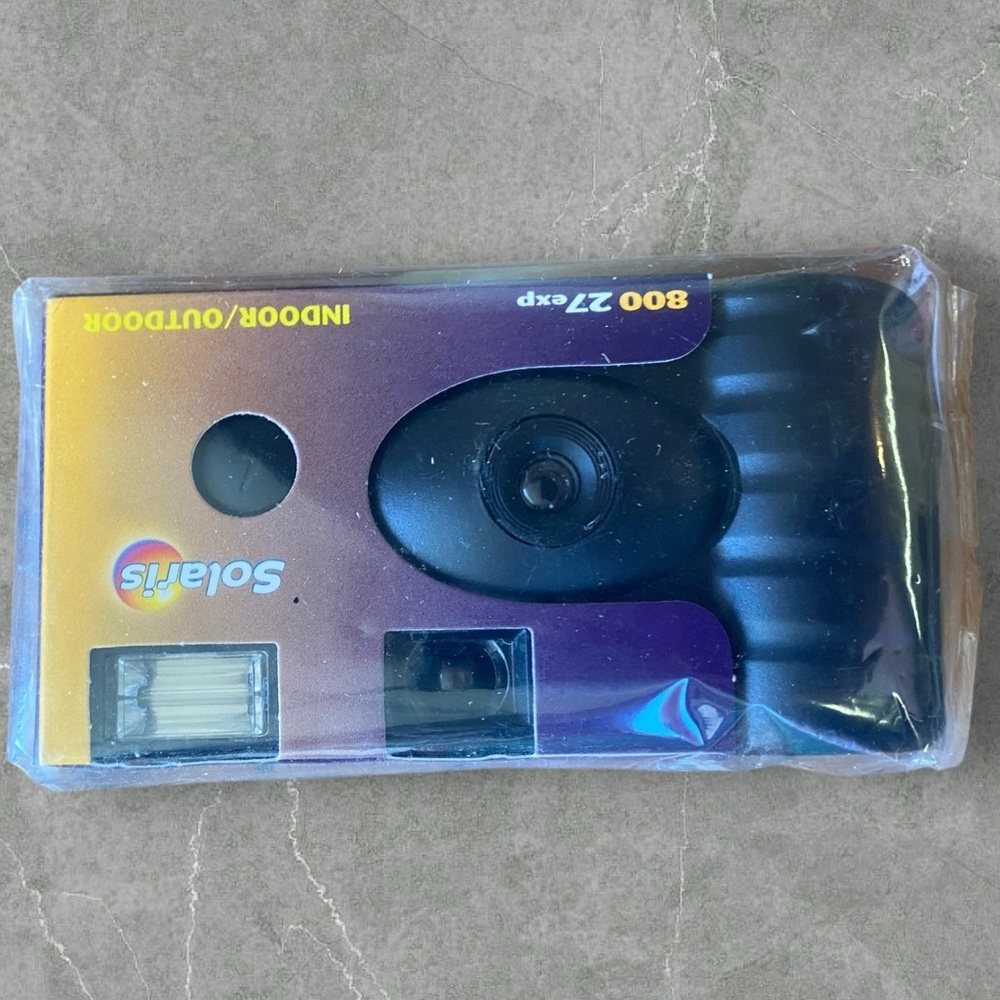 New in package Solaris disposable camera 25 pictures left ( with flash )